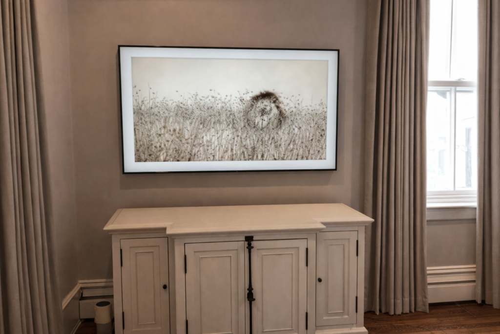 Professional Hanging Artwork in Boston with Mr Home Guy